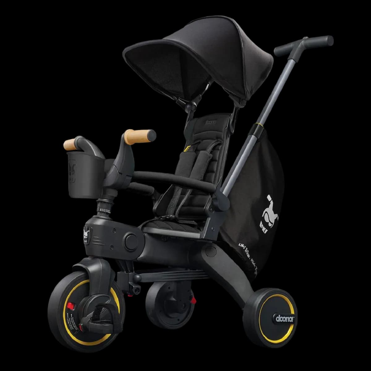 Doona Liki Trike in black with canopy and parent handle